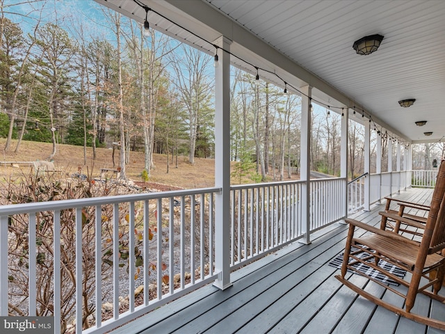 deck with covered porch