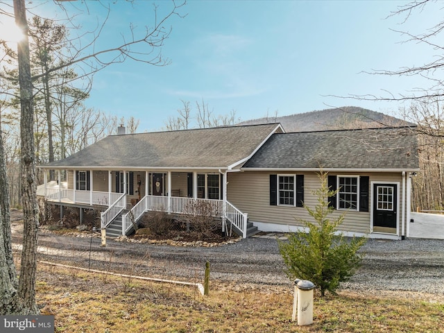 ranch-style home with covered porch