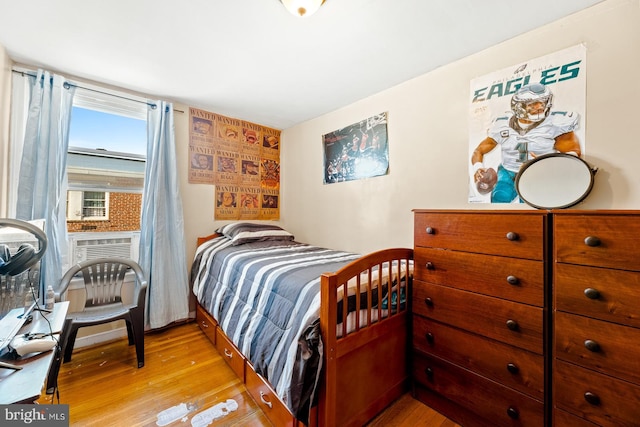 bedroom with light hardwood / wood-style floors