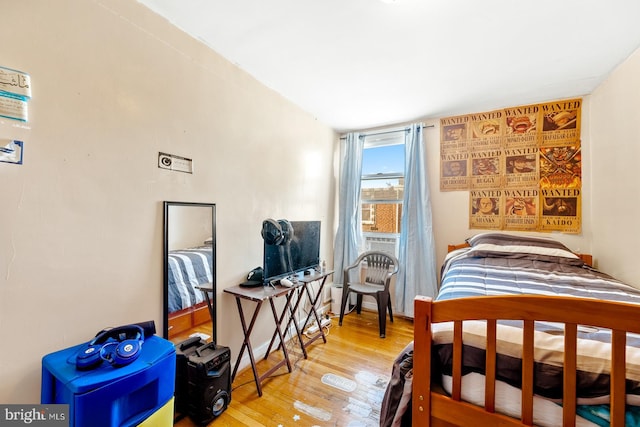 bedroom featuring hardwood / wood-style flooring