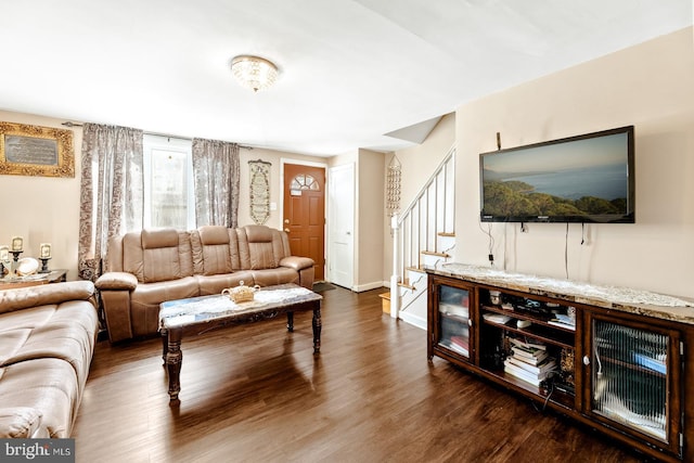 living room featuring dark hardwood / wood-style floors