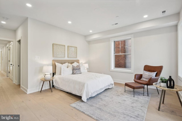 bedroom with light hardwood / wood-style flooring