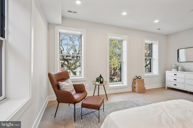 bedroom with light hardwood / wood-style flooring