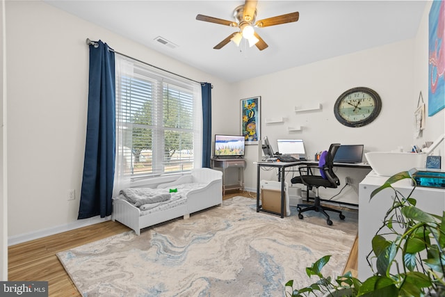 office featuring ceiling fan and wood-type flooring