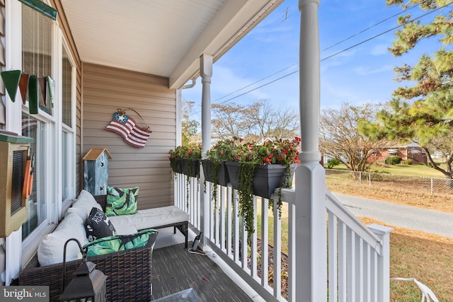 balcony featuring covered porch