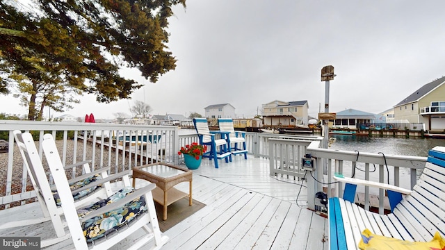 deck featuring a water view