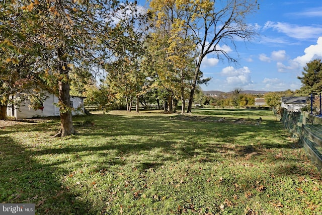 view of yard with fence