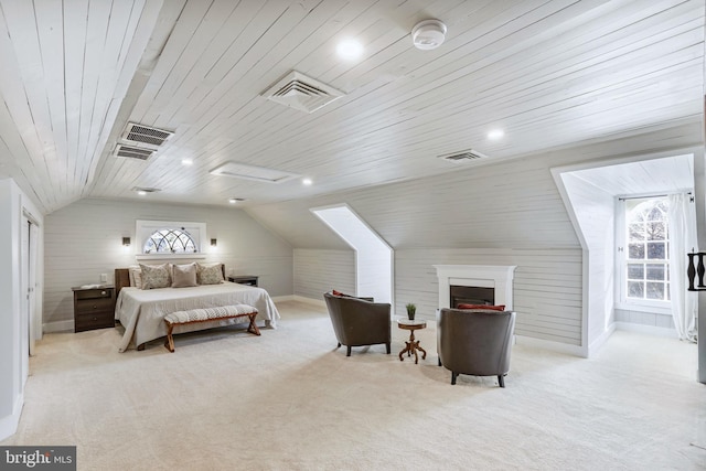 bedroom with wooden ceiling, light carpet, vaulted ceiling, and visible vents