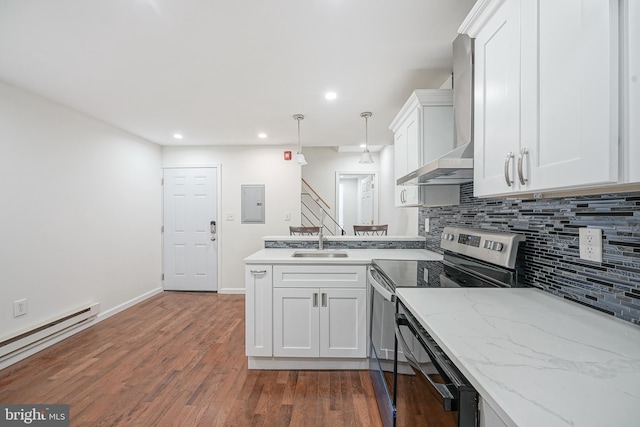 kitchen with dark hardwood / wood-style flooring, a baseboard heating unit, pendant lighting, white cabinetry, and stainless steel range with electric cooktop