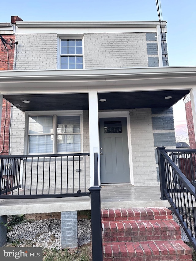 property entrance with a porch