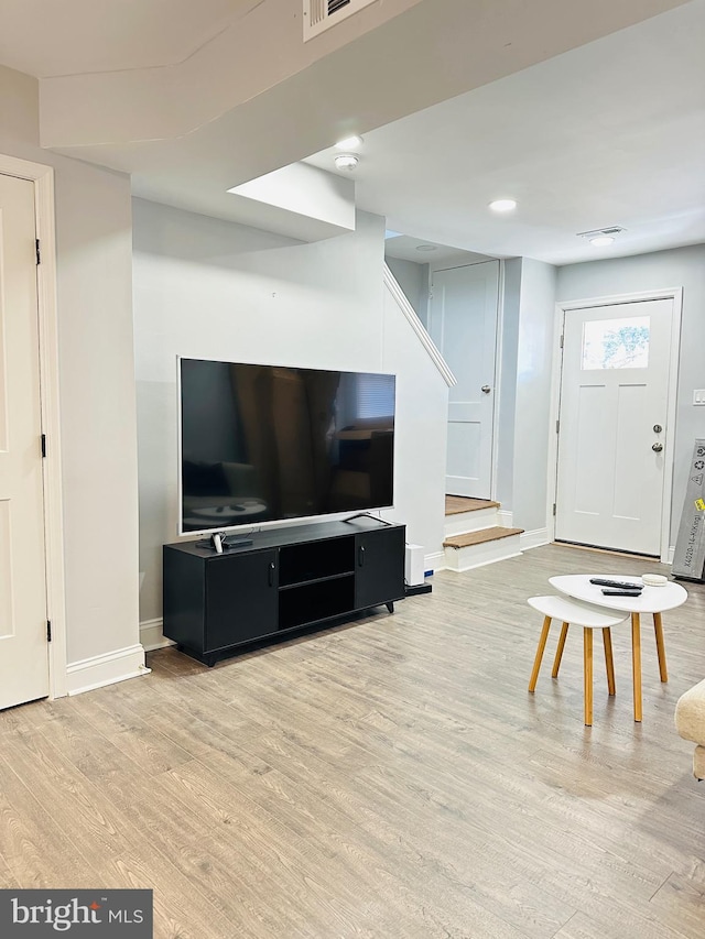 living room featuring light hardwood / wood-style flooring