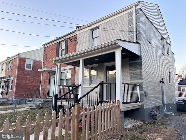 view of front of house featuring central air condition unit