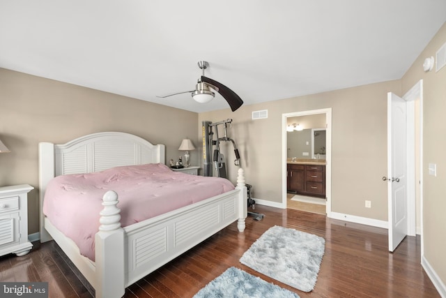 bedroom with connected bathroom, ceiling fan, and dark wood-type flooring