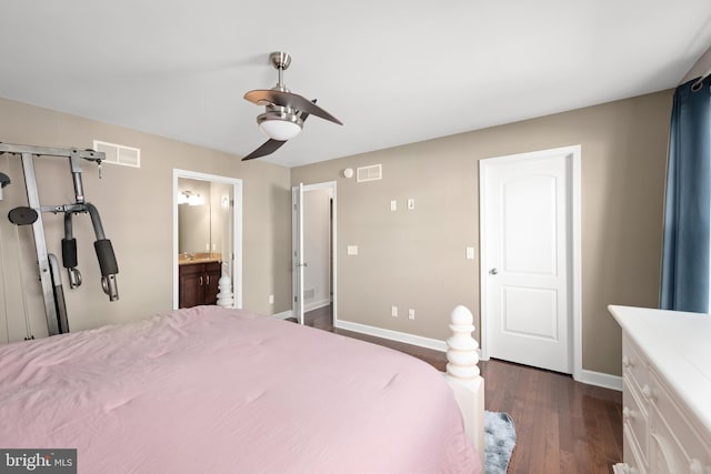 bedroom with dark hardwood / wood-style floors, ceiling fan, and ensuite bathroom