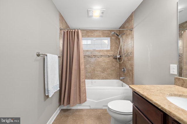 full bathroom featuring tile patterned floors, shower / tub combo with curtain, vanity, and toilet