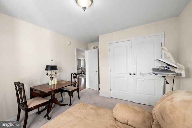 office area with light colored carpet