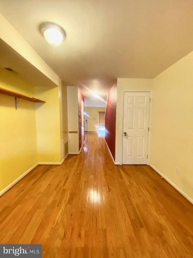 corridor featuring light wood-type flooring