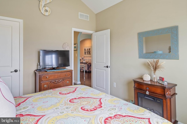 bedroom with vaulted ceiling