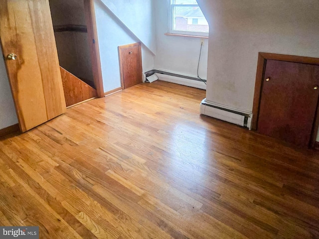 115 Mountain View Rd, Armagh, PA 15920 - bonus room with a baseboard radiator, wood finished floors, and baseboards