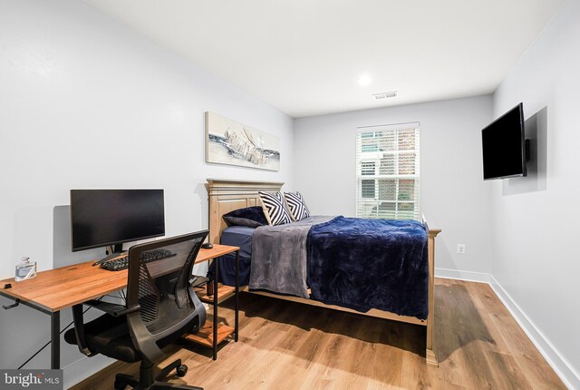 bedroom featuring light hardwood / wood-style flooring