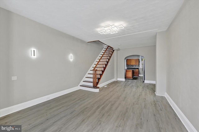 unfurnished living room featuring light hardwood / wood-style flooring