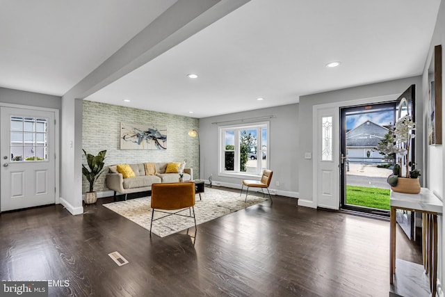 living room featuring dark hardwood / wood-style floors