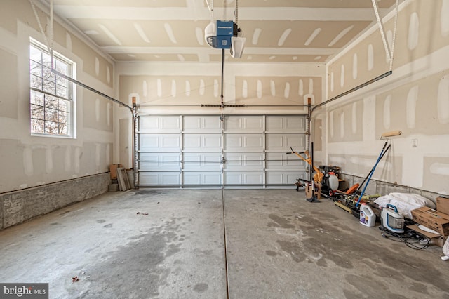 garage featuring a garage door opener