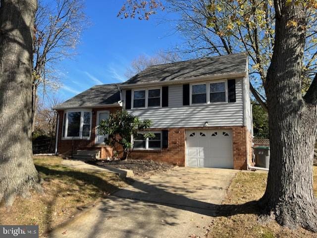 split level home featuring a garage