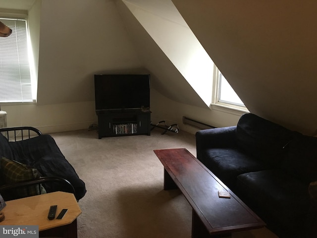 carpeted living room featuring lofted ceiling