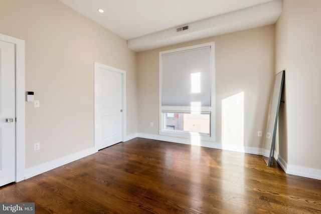 entrance foyer with dark hardwood / wood-style floors