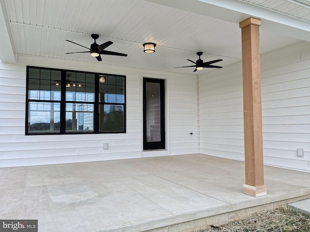 view of patio / terrace featuring ceiling fan