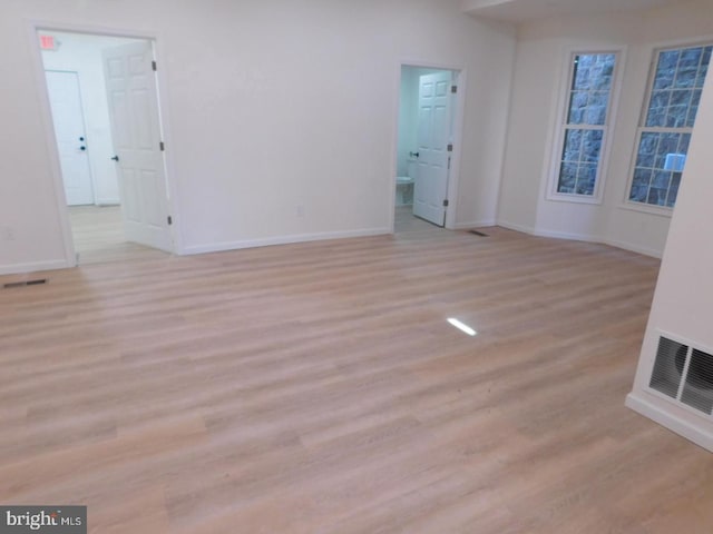 empty room featuring light hardwood / wood-style floors