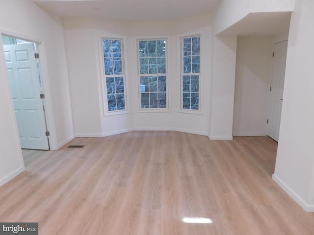 205 N Furnace St, Birdsboro, PA 19508 - unfurnished living room with light wood-style floors and baseboards