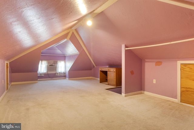 bonus room featuring carpet and vaulted ceiling