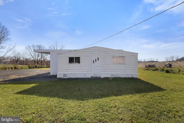 exterior space with a lawn