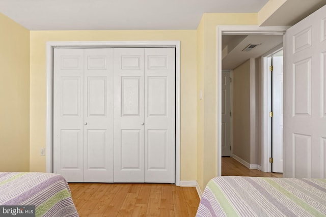 213 E Hand Ave, Wildwood, NJ 08260 - bedroom featuring a closet, light wood-type flooring, and baseboards