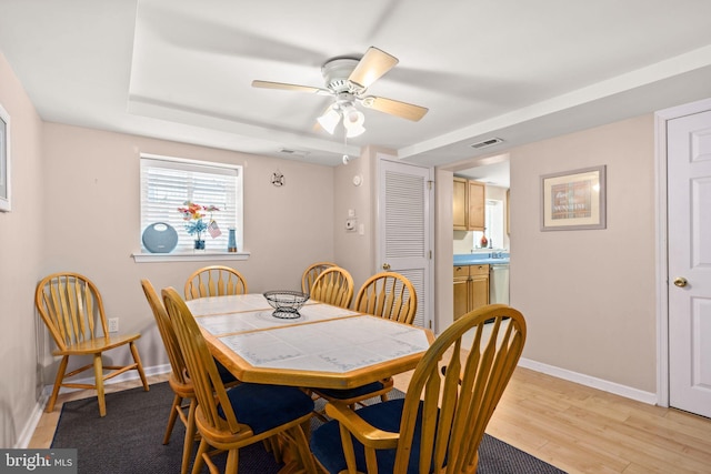 213 E Hand Ave, Wildwood, NJ 08260 - dining room featuring baseboards, light wood-type flooring, and ceiling fan