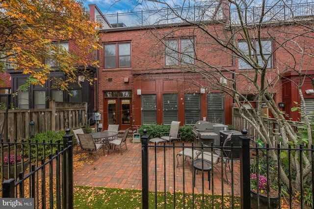 rear view of property with a patio area