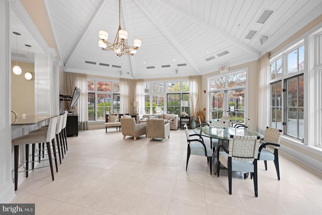 dining area with beamed ceiling, high vaulted ceiling, light tile patterned flooring, and a notable chandelier