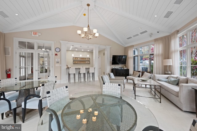 dining space featuring french doors, wooden ceiling, high vaulted ceiling, a notable chandelier, and light tile patterned floors