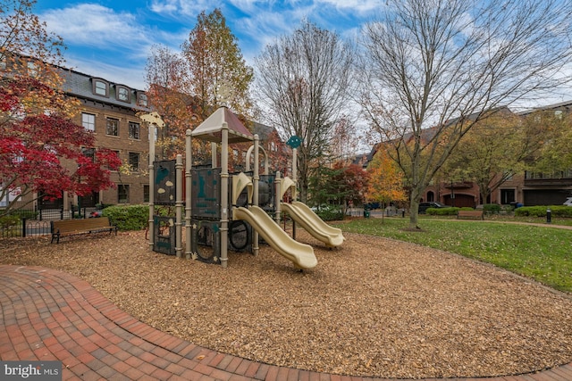 view of playground with a yard