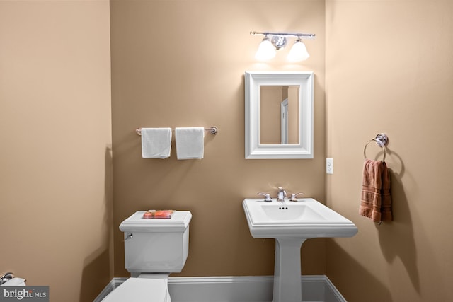 bathroom featuring toilet