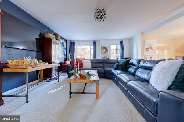 living room featuring light colored carpet