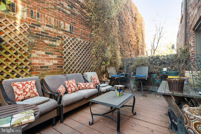 deck featuring outdoor lounge area