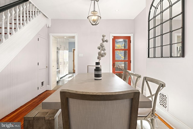 dining space featuring hardwood / wood-style floors