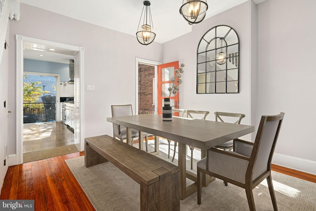 dining area featuring hardwood / wood-style floors