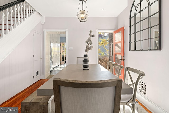 dining area featuring hardwood / wood-style floors