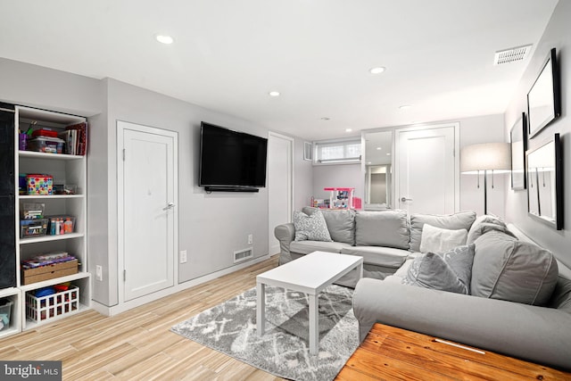 living room featuring light hardwood / wood-style flooring