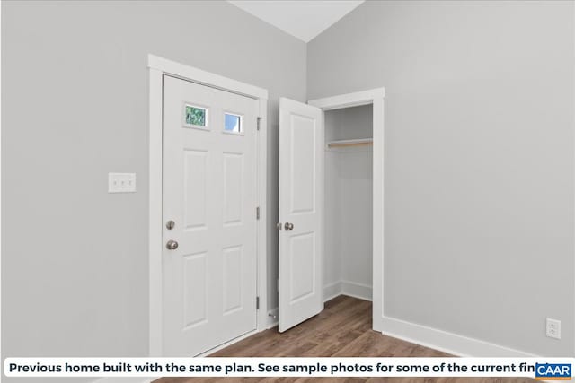 entrance foyer with dark hardwood / wood-style flooring