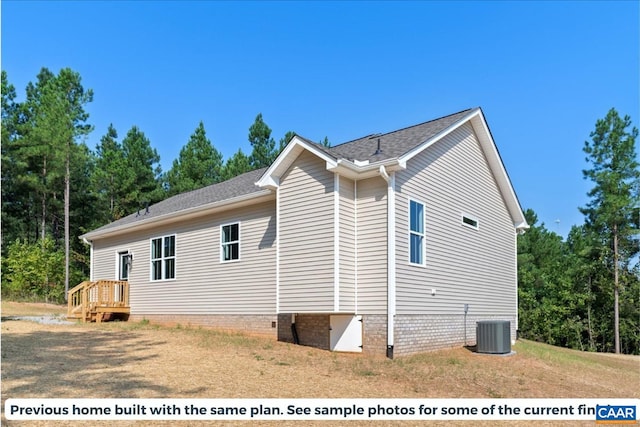 view of home's exterior featuring central air condition unit